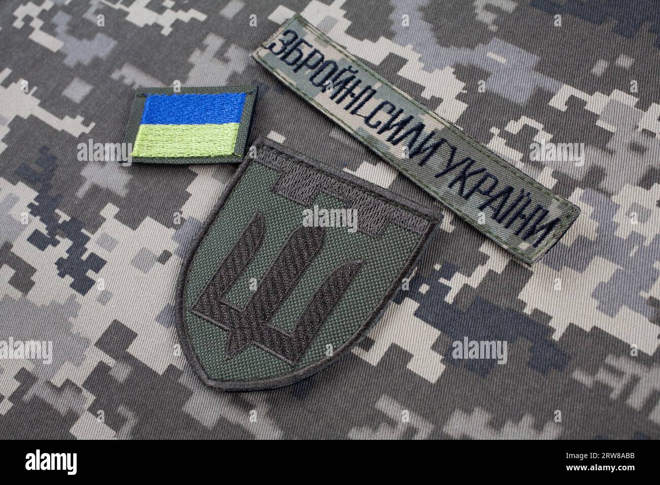 KYIV, UKRAINE - October 6, 2022. Russian invasion in Ukraine 2022. Territorial Defence Forces of Ukraine uniform insignia badge on camouflaged uniform Stock Photo