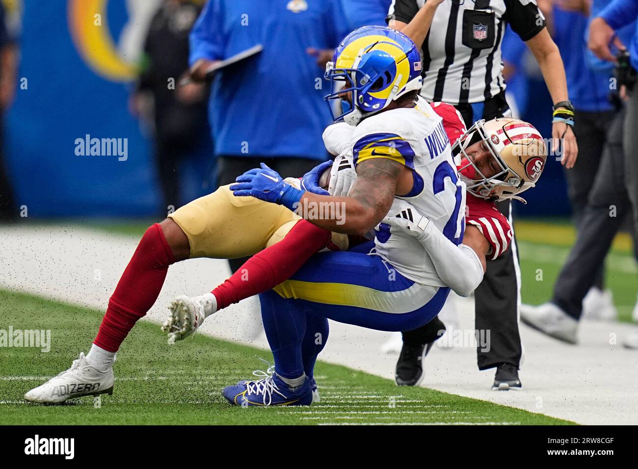 San Francisco 49ers cornerback Isaiah Oliver, right, tackles Los