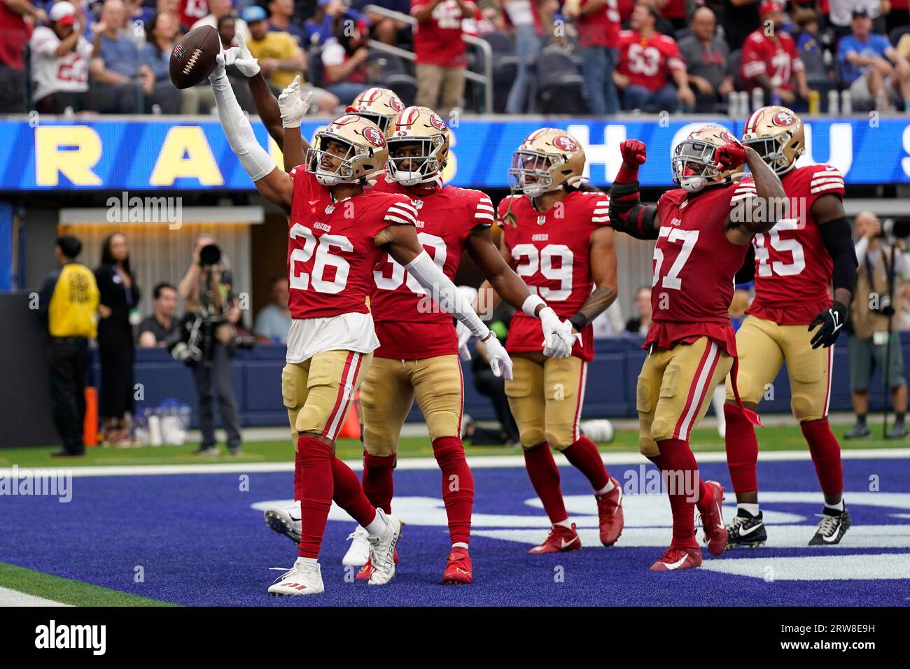 San Francisco 49ers cornerback Isaiah Oliver, left, celebrates with