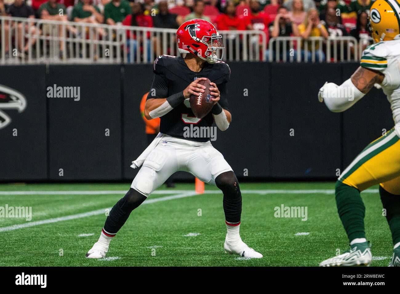 Atlanta Falcons quarterback Desmond Ridder (9) works during the first half  of an NFL football game against the Green Bay Packers, Sunday, Sep. 17,  2023, in Atlanta. The Atlanta Falcons won 25-24. (