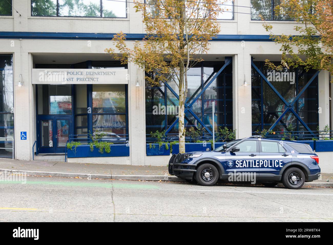Seattle - September 17, 2023; Patrol car parked outside Seattle Police Department East Precinct building Stock Photo