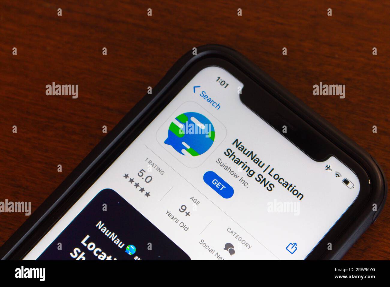 NauNau app seen in App Store on iPhone screen. NauNau is a service that