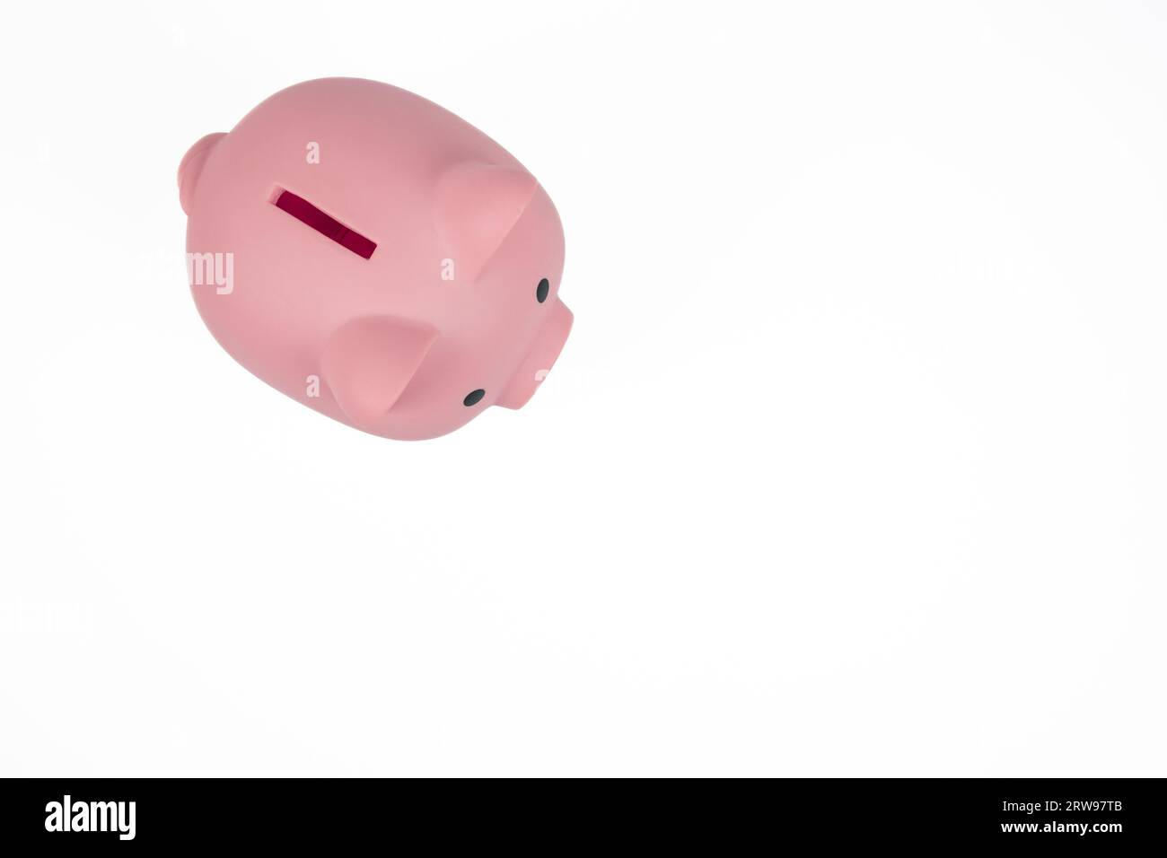 Piggy bank isolated on white background Stock Photo - Alamy