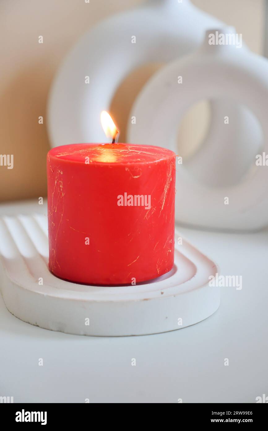 color candles slowly burning down in dark Stock Photo Alamy
