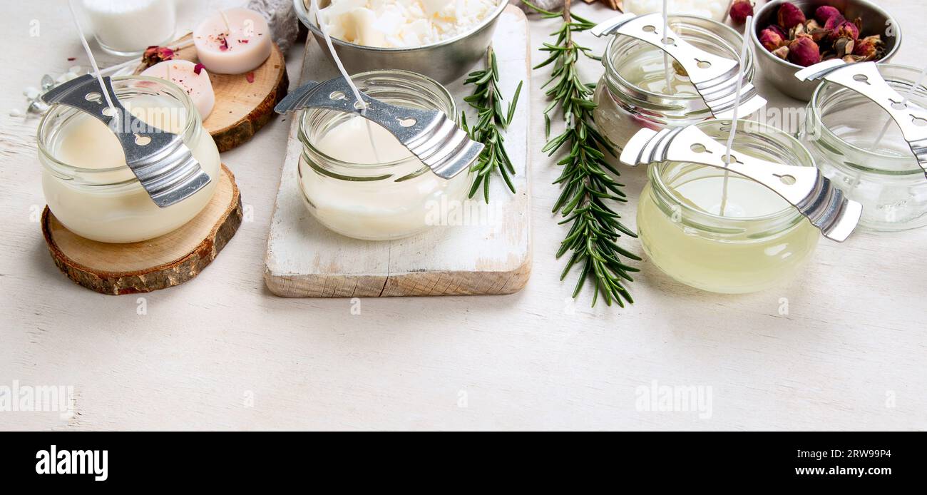 Set for homemade natural eco soy wax candles on white background. Making diy candles. Top view