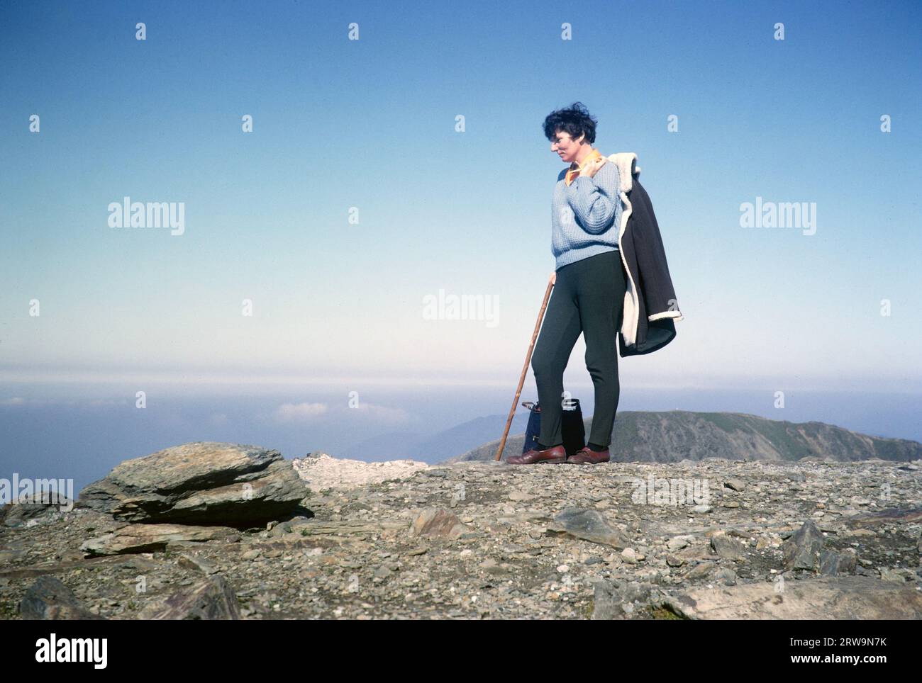 Woman walker standing at summit of Mount Snowdon, Snowdonia, north Wales, Uk 1966 Stock Photo