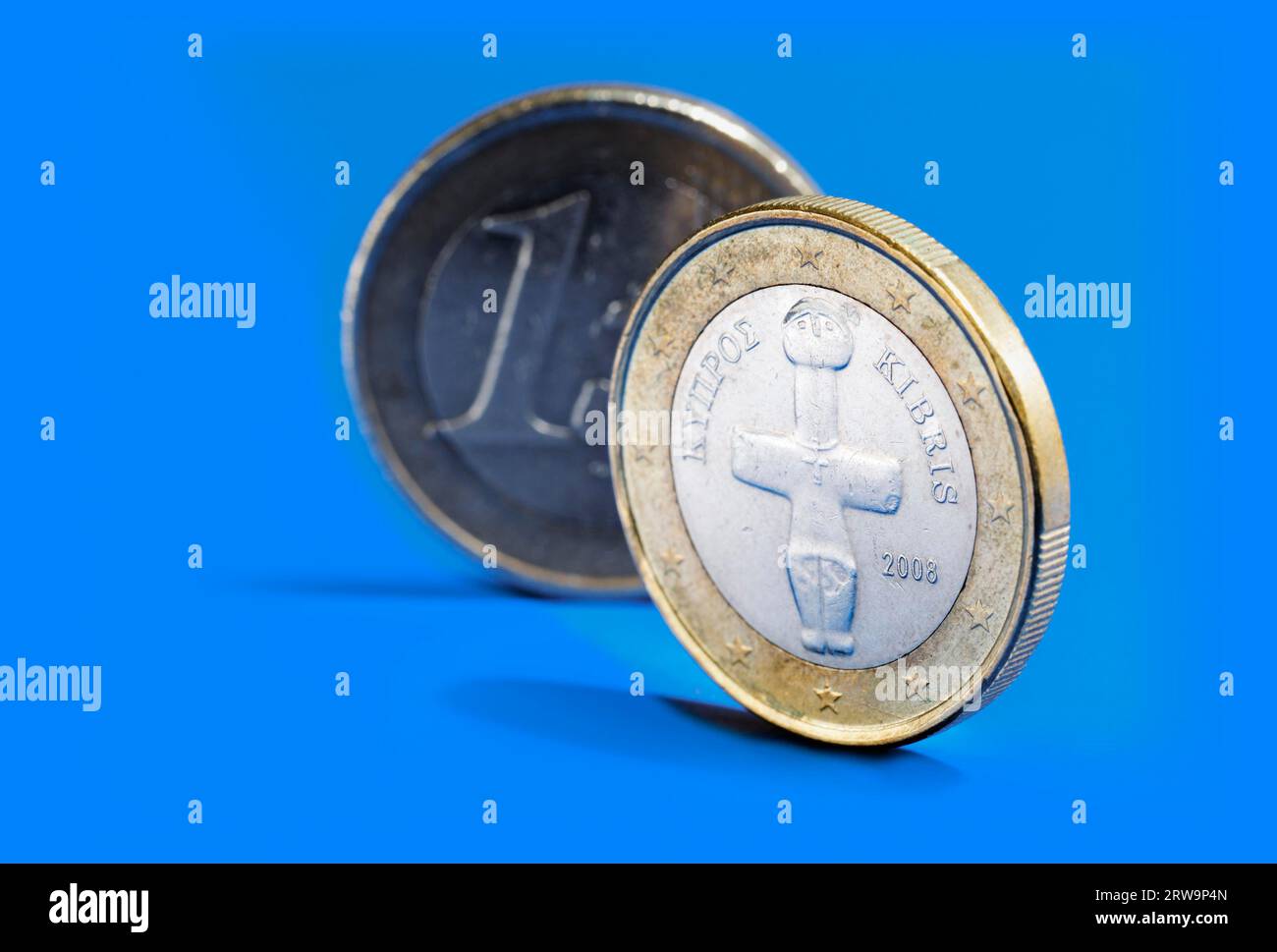 Euro coins from Cyprus on blue background Stock Photo