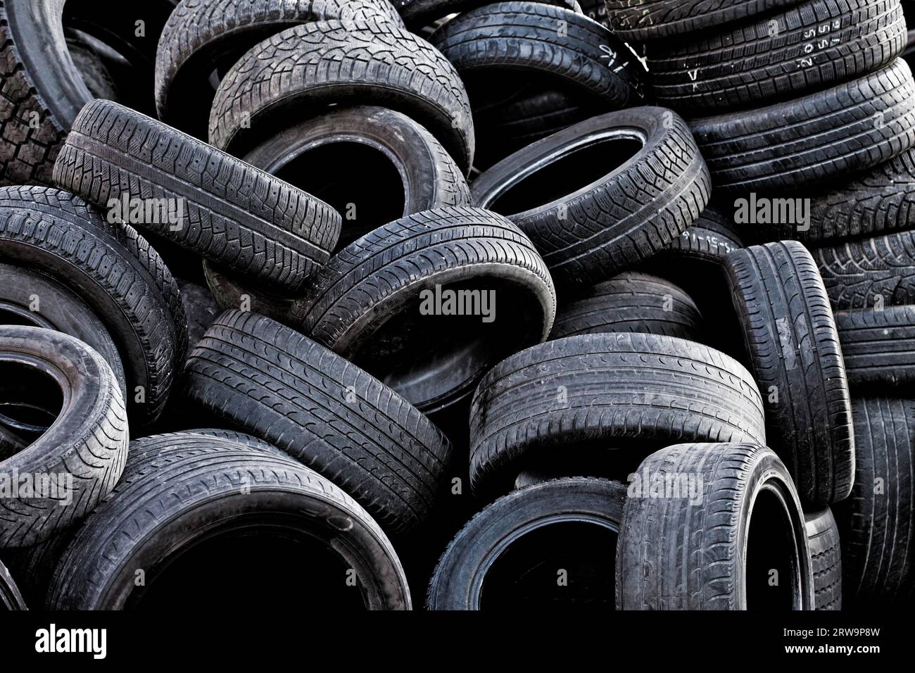 Pile of old used car tires Stock Photo