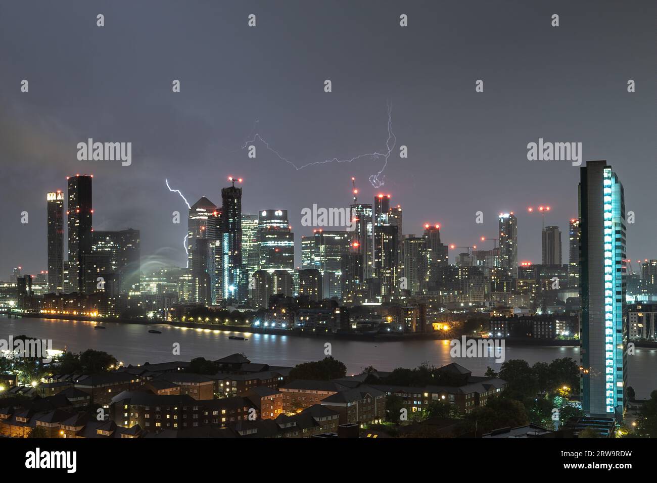 London, UK. 18th September 2023. UK Weather: Lightning strikes over Canary Wharf in the early hours of Monday as yellow warnings are issued by the Met Office for the east midlands and south-east England. Credit: Guy Corbishley/Alamy Live News Stock Photo