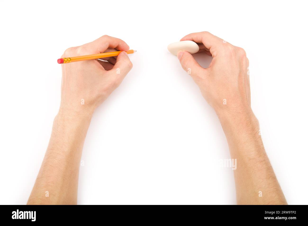Left-handed person with pencil and eraser Stock Photo