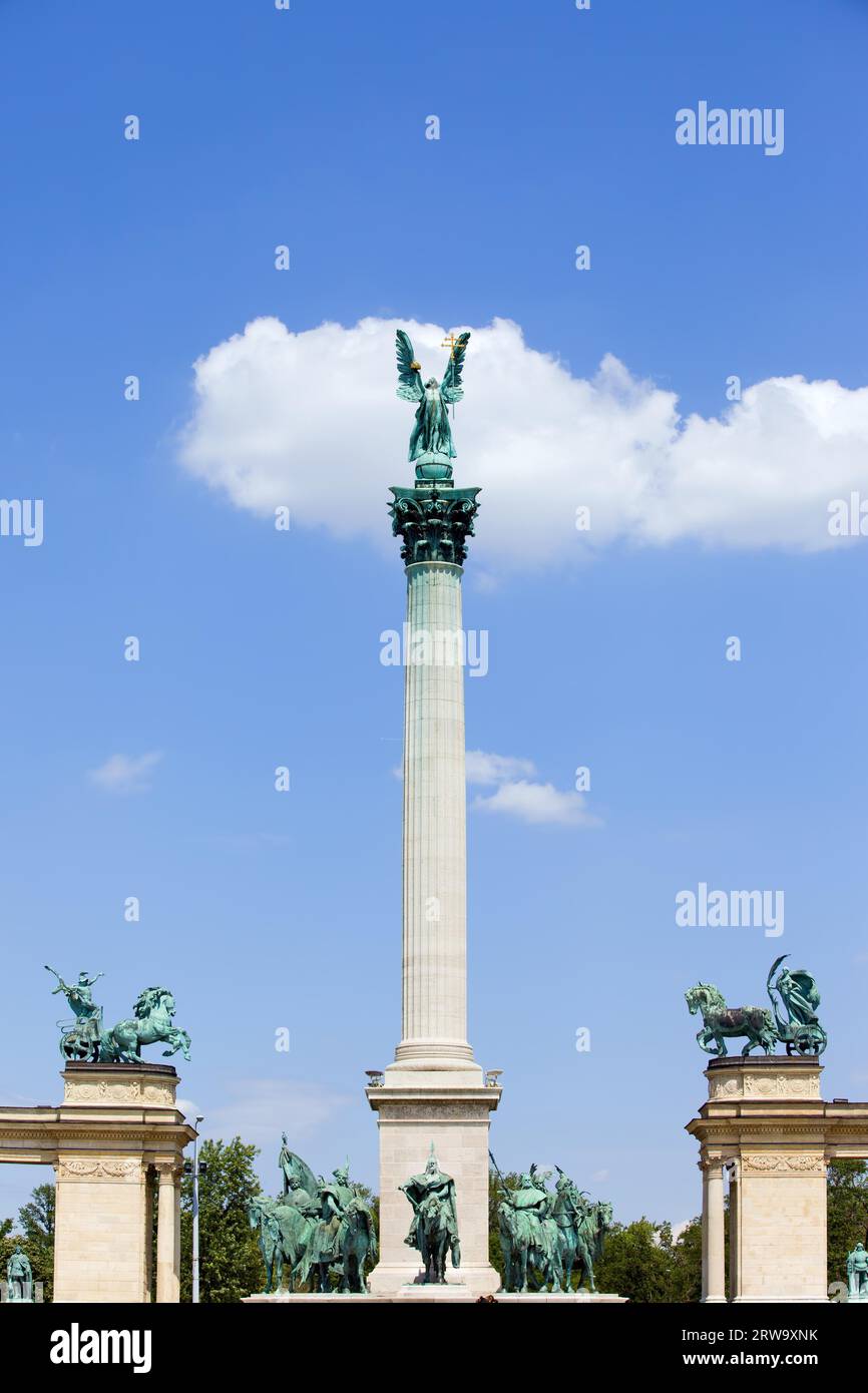 Millennium Monument in Budapest, Hungary with statue of Archangel Gabriel on Corinthian column, Magyar chieftains at the bottom, flanked by Peace and Stock Photo