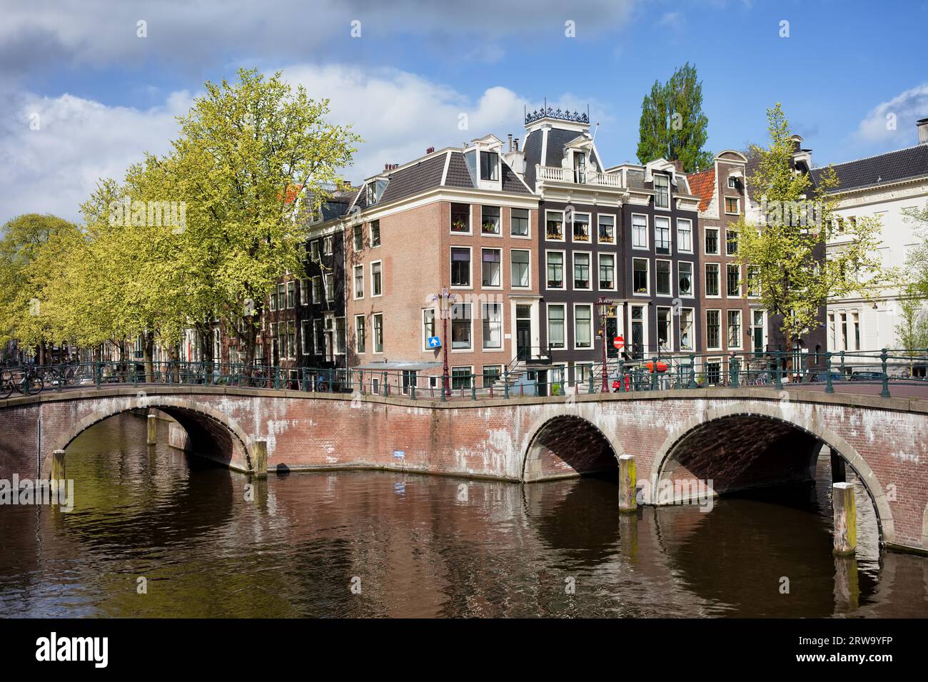 Traditional Dutch style canal houses in Amsterdam, Netherlands Stock ...