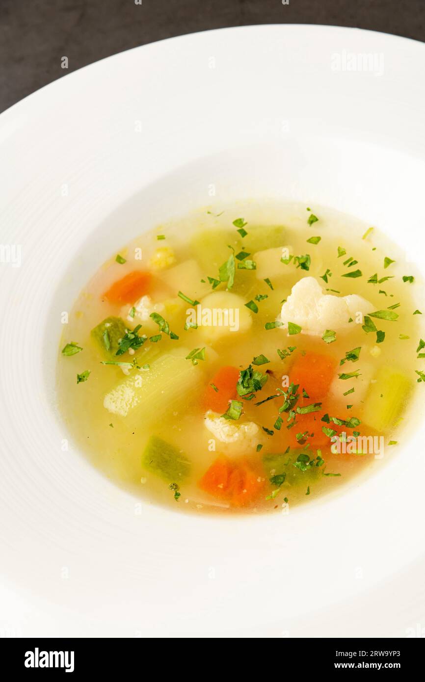 Italian vegetable soup minestrone made with a variety of vegetables Stock Photo