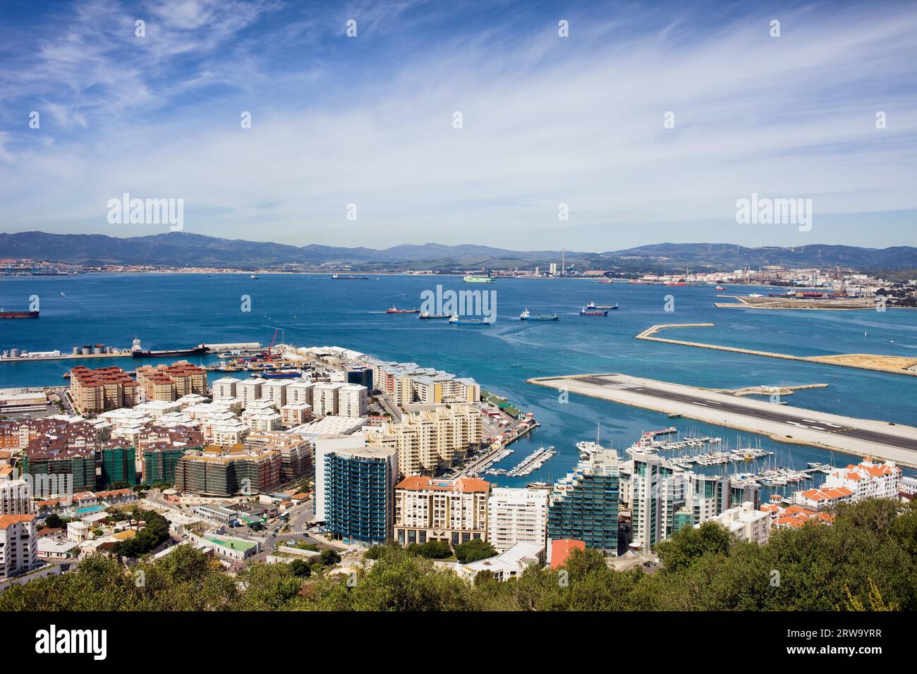 Gibraltar city and bay from above, Spain on the horizon Stock Photo