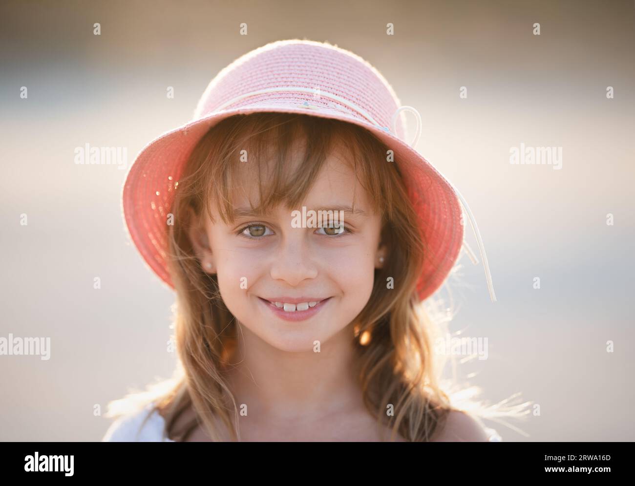 Beautiful smiling girl in panama Stock Photo