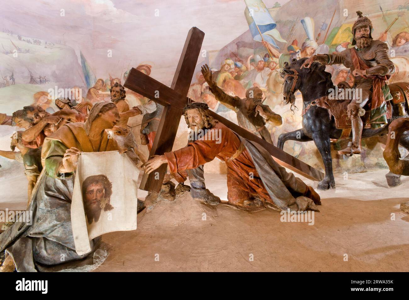 Veronica dries the face of the fallen Jesus. Scene of lifesize