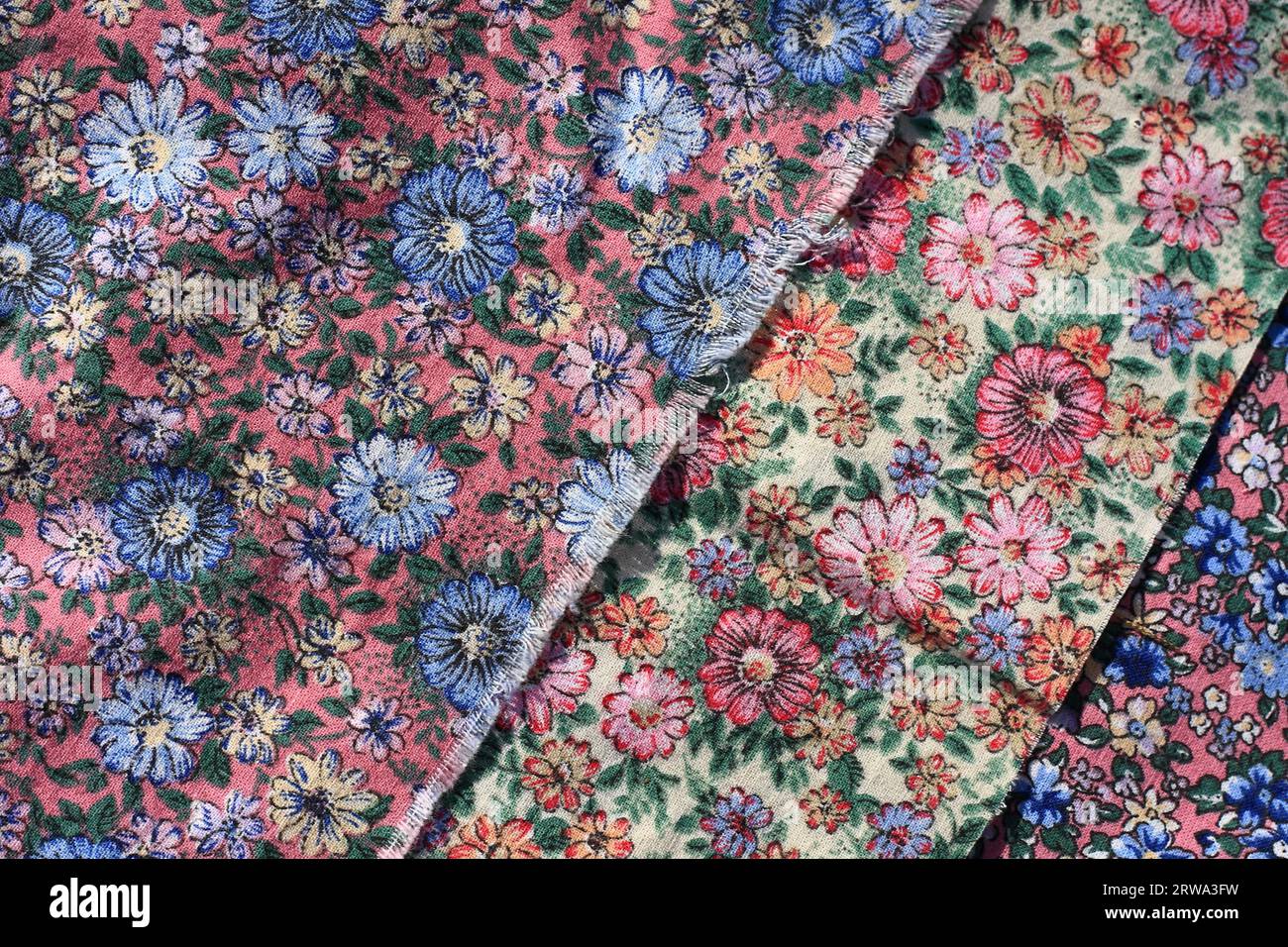 Three fabric panels in different floral patterns, format-filling Stock ...