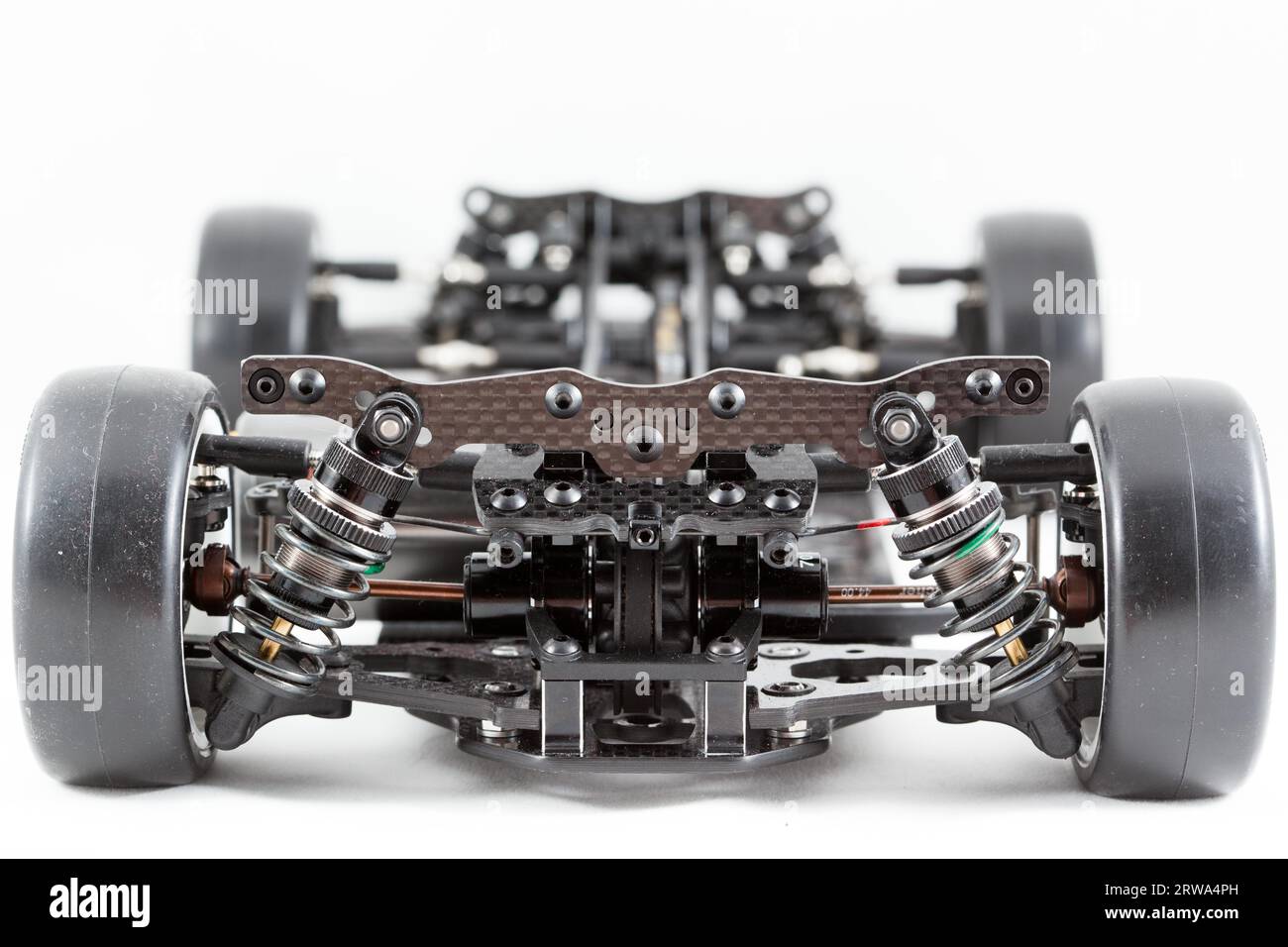 RC car chassis and parts being built to form a radio controlled race
