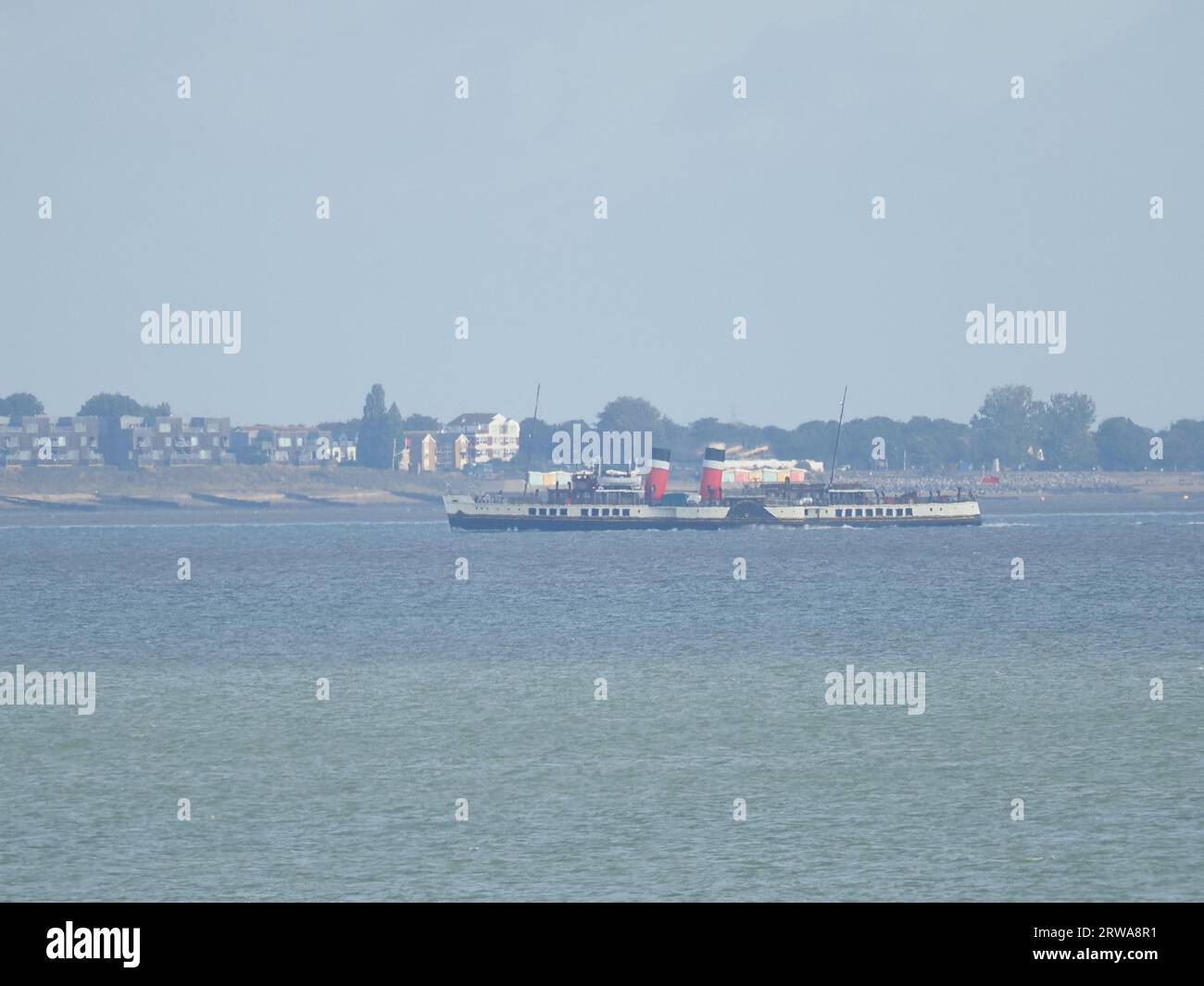 Sheerness, Kent, UK. 18th Sep, 2023. The historic Waverley paddlesteamer seen passing Sheerness, Kent as she arrives on the Thames. Due to strong winds she's berthing at Gravesend until her first official Thames estuary trip on Friday. Pic: passing Southend on Sea pier in the background. James Bell/Alamy Live News Stock Photo