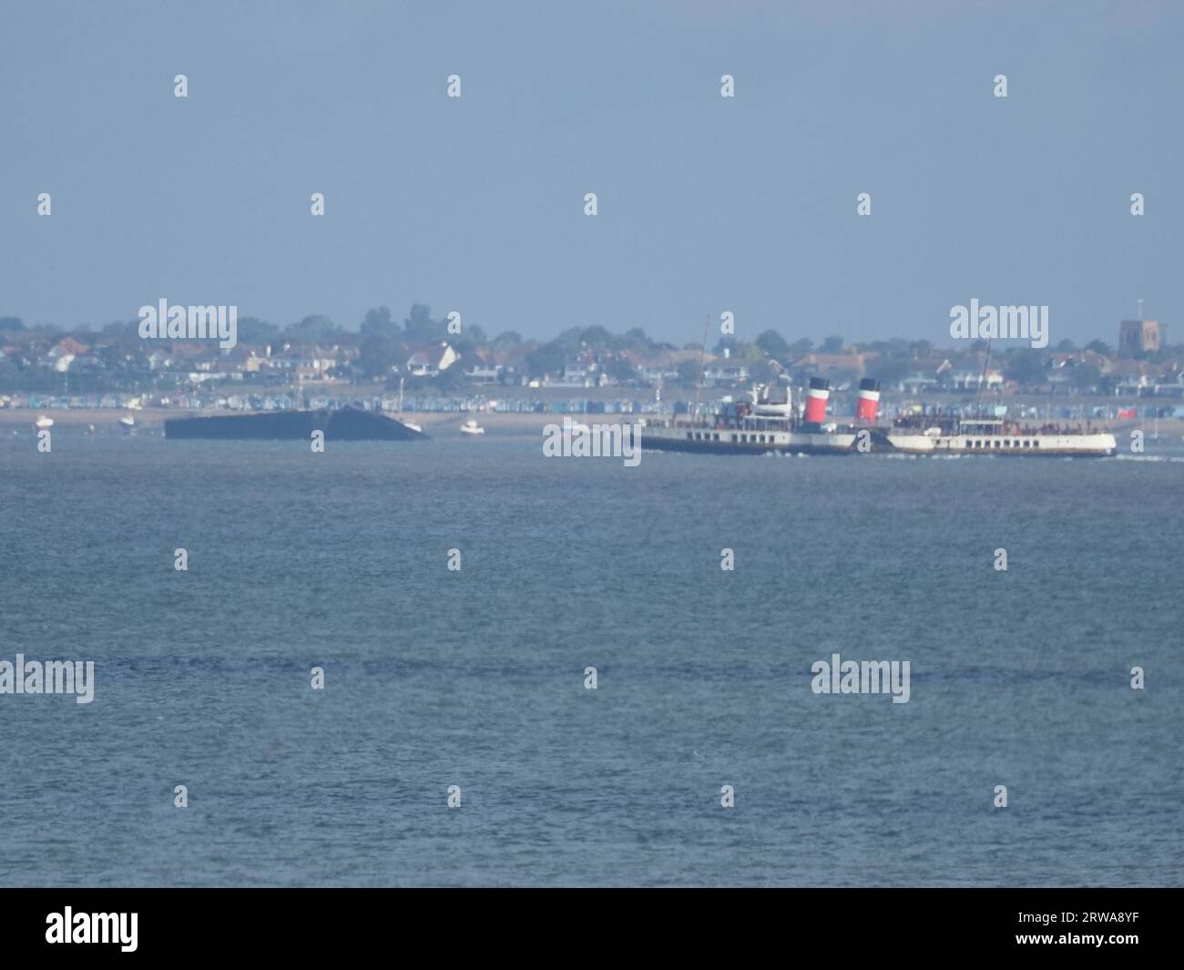 Sheerness, Kent, UK. 18th Sep, 2023. The historic Waverley paddlesteamer seen passing Sheerness, Kent as she arrives on the Thames. Due to strong winds she's berthing at Gravesend until her first official Thames estuary trip on Friday. Pic: passing Southend on Sea pier in the background. James Bell/Alamy Live News Stock Photo