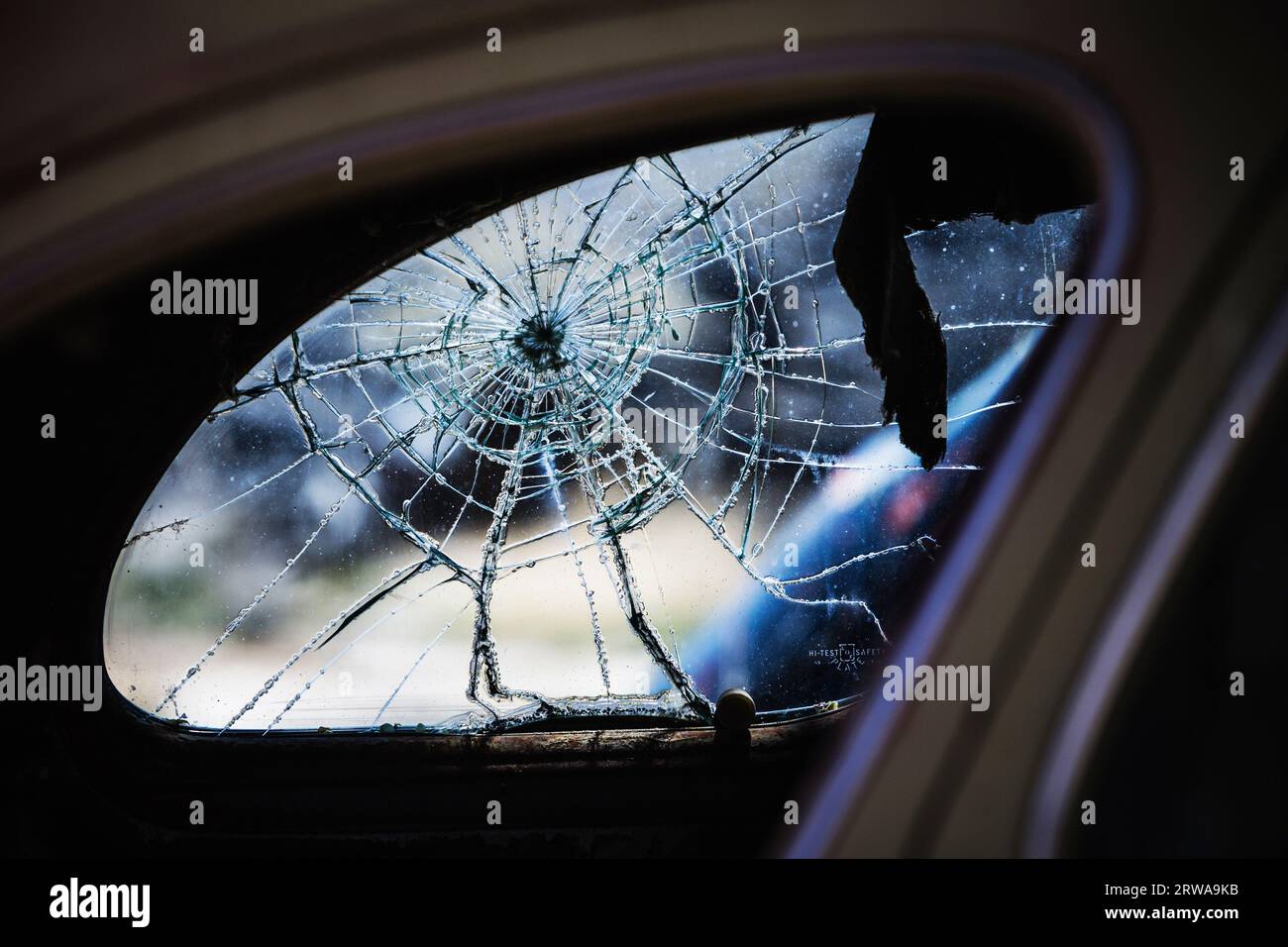 Cracked rear window of old car, Mono County, California, USA Stock Photo