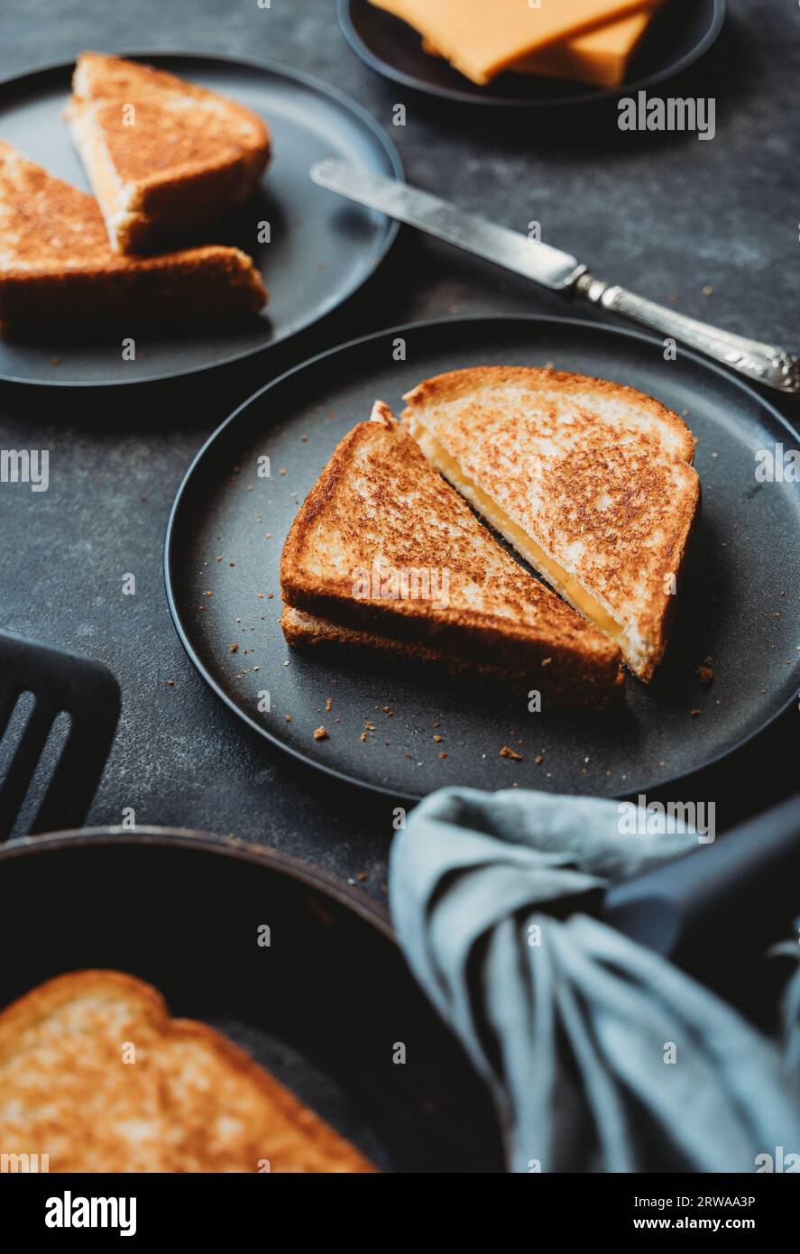 Grilled cheese sandwich being grilled in frying pan Stock Photo - Alamy