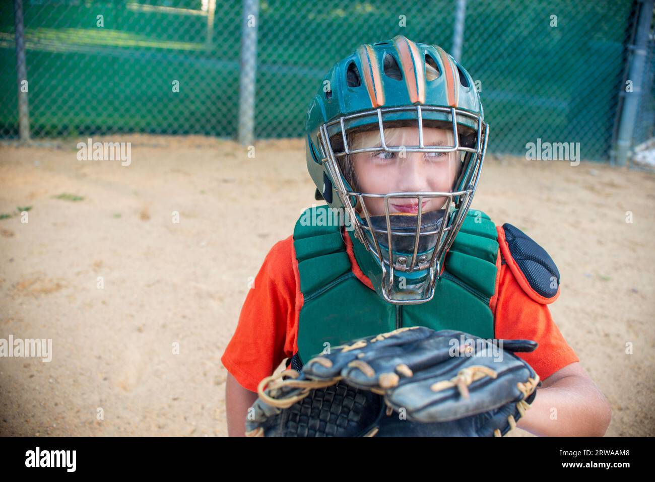 a 10 year old female catcher who is on the team Stock Photo Alamy