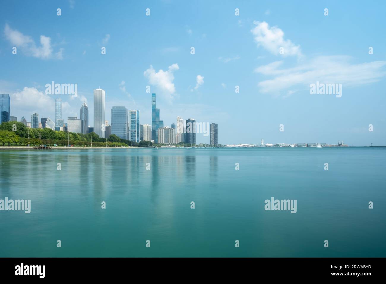 Chicago skyline, as seen in distance from across Lake Michigan Stock