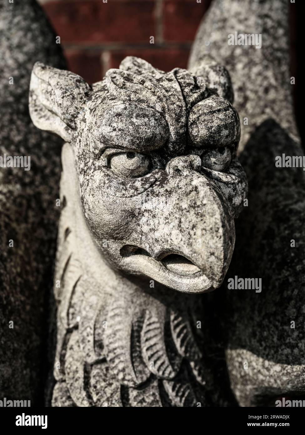 A detail of one the Griffins that guard the entrance to Bletchley Park mansion house. Known as 'Station X', Bletchley Park was home to the code-breake Stock Photo