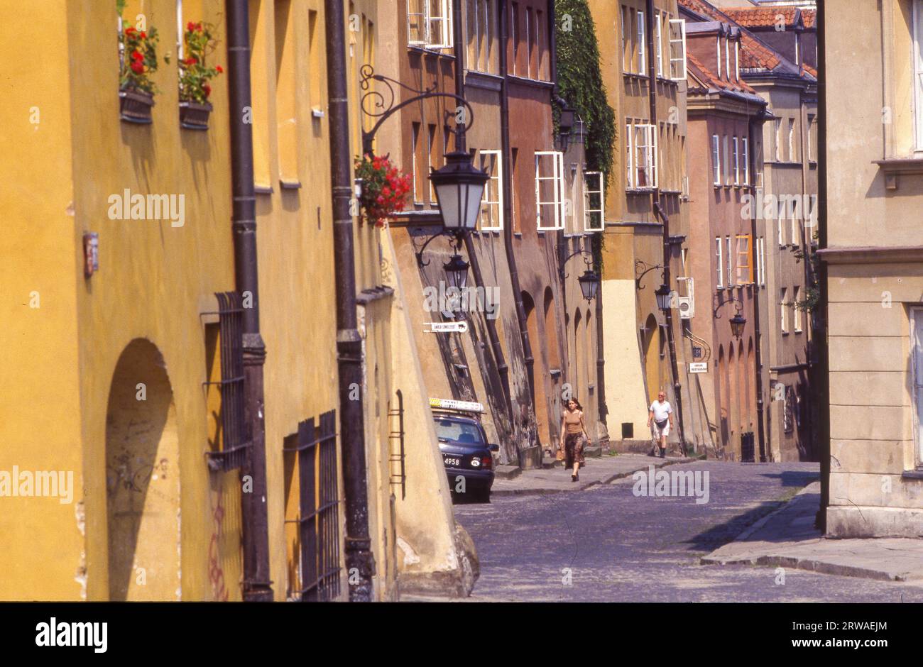 Poland, narrow street in Warsaw old city centre. Stock Photo