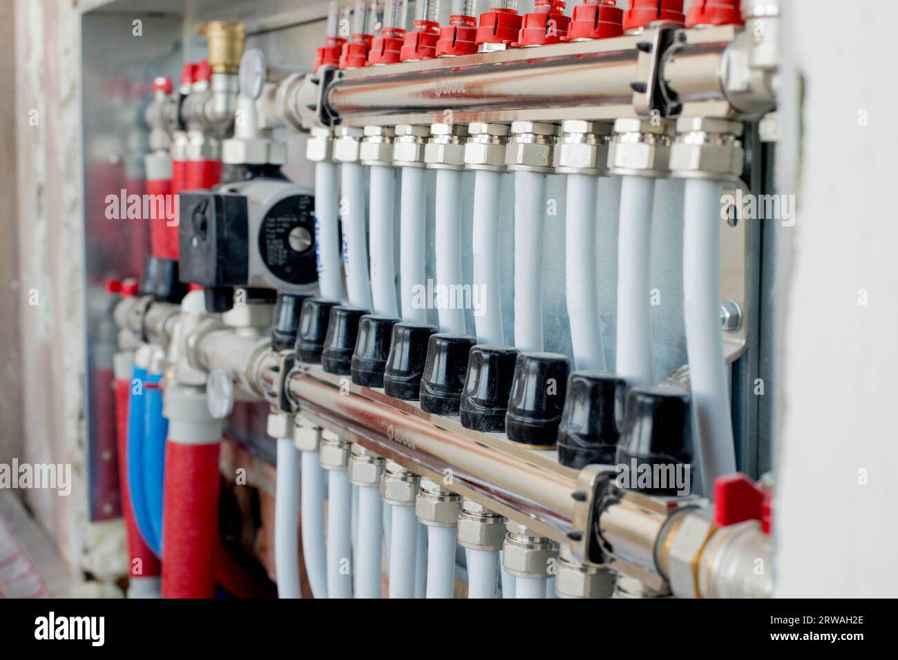 Install system Manifold Assembly of underfloor heating at home Stock