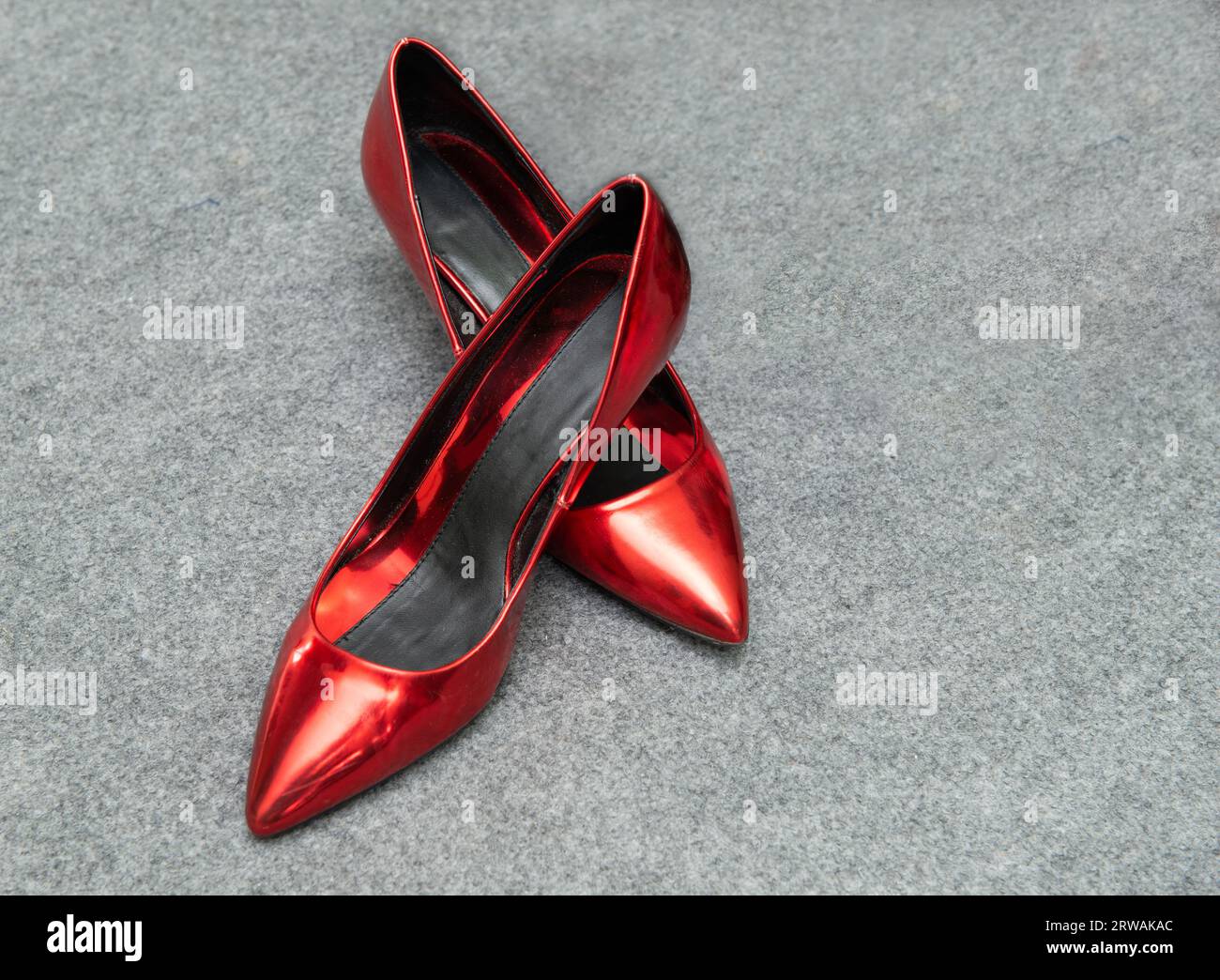Close-up of a pair of patent red high heel shoes Stock Photo