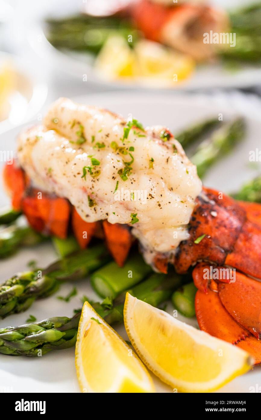 Garlic lobster tails Stock Photo Alamy