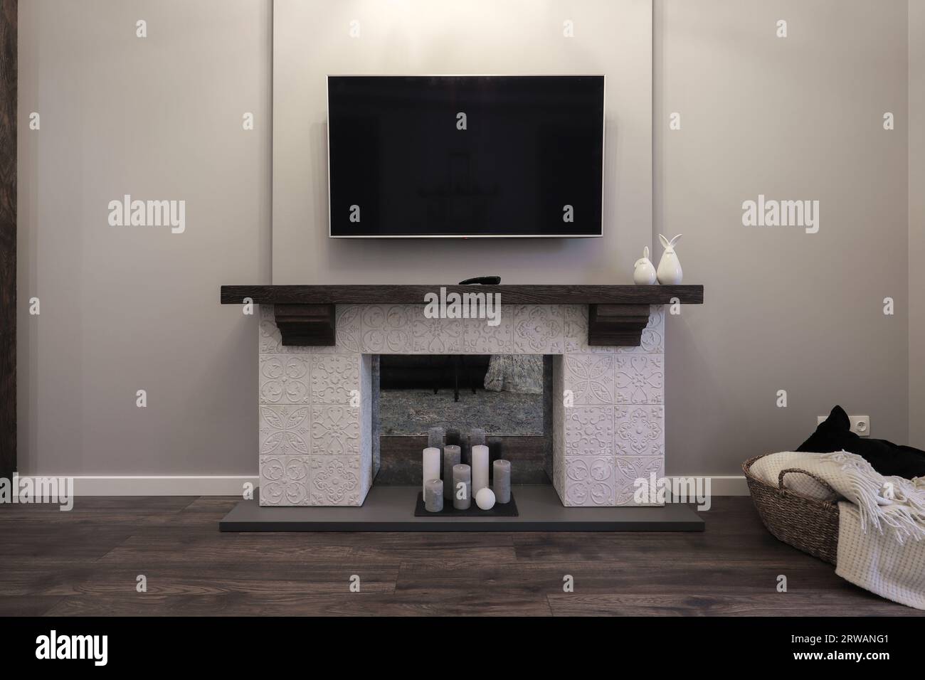 Modern TV hanging on the wall in the living room Stock Photo Alamy