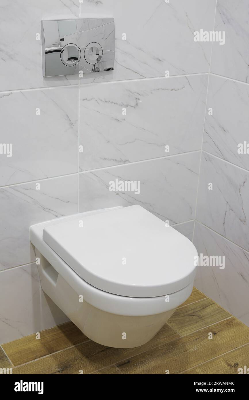 White toilet bowl in a modern bathroom interior Stock Photo - Alamy