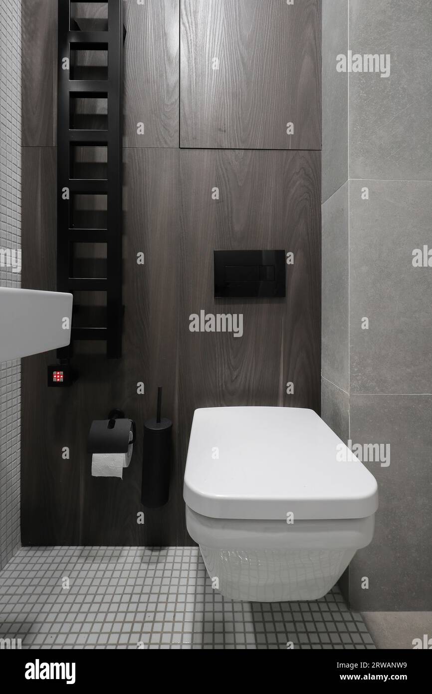 White toilet bowl in a modern bathroom interior Stock Photo - Alamy