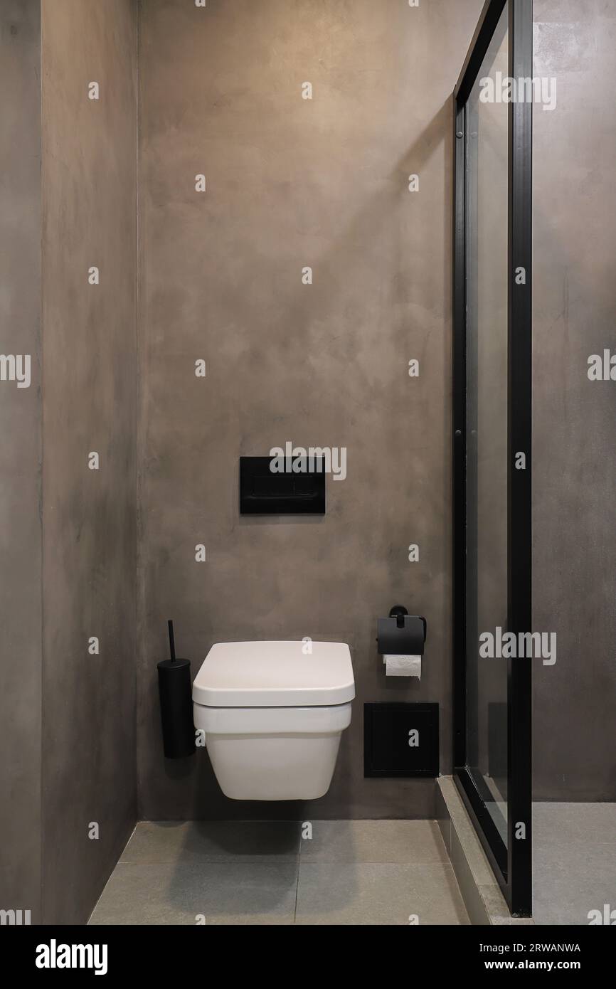 White toilet bowl in a modern bathroom interior Stock Photo - Alamy