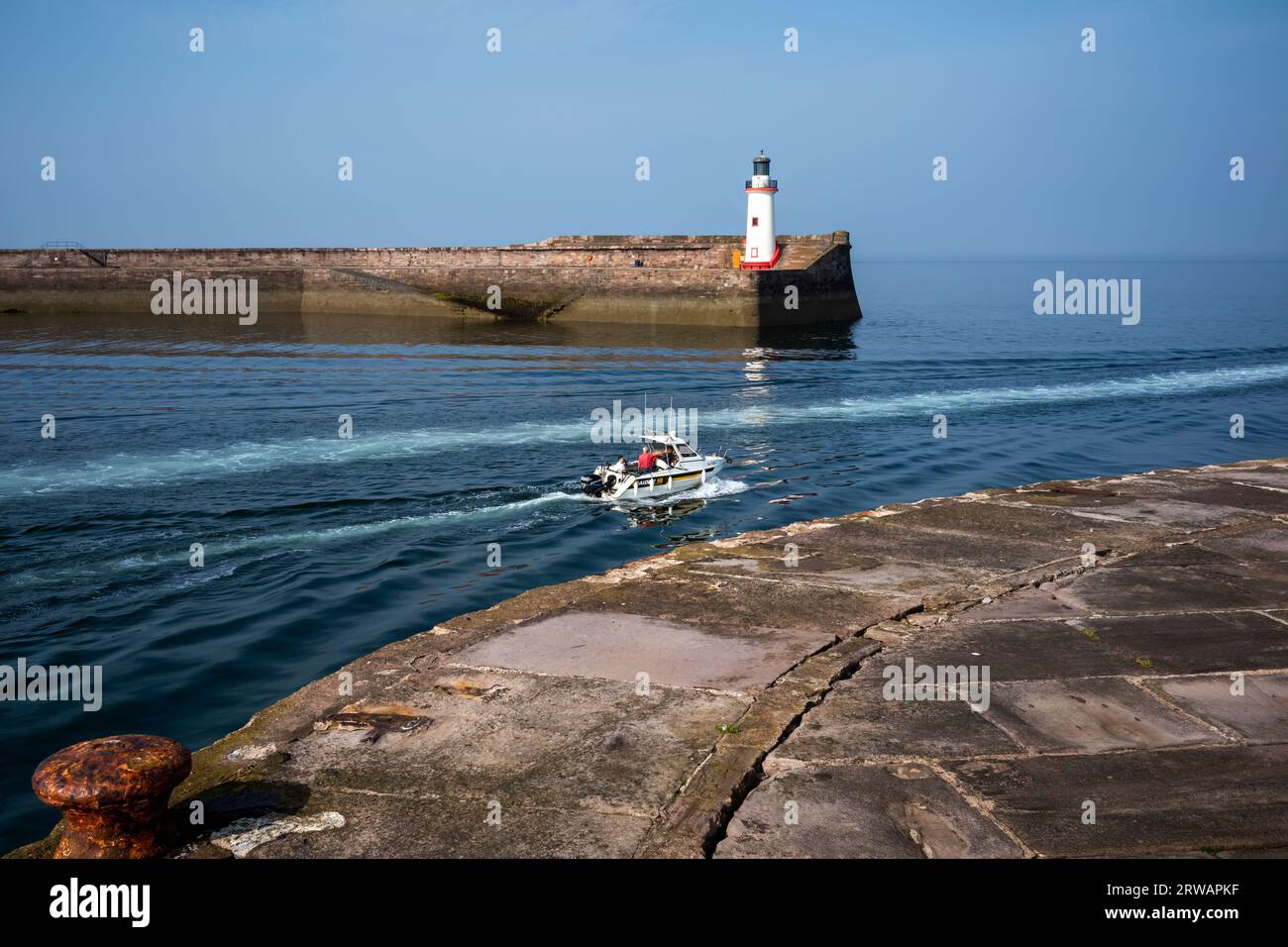 Modern fishermen departing from Whitehaven harbour, West Cumbria, UK Stock Photo