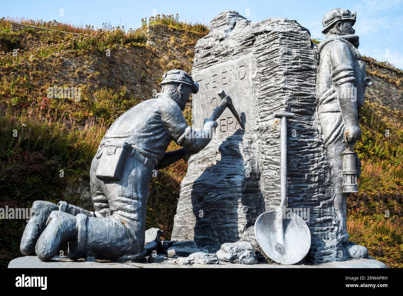 A tribute to the miners of Whitehaven by Colin Telfer (2005), Whitehaven harbour, West Cumbria, UK Stock Photo