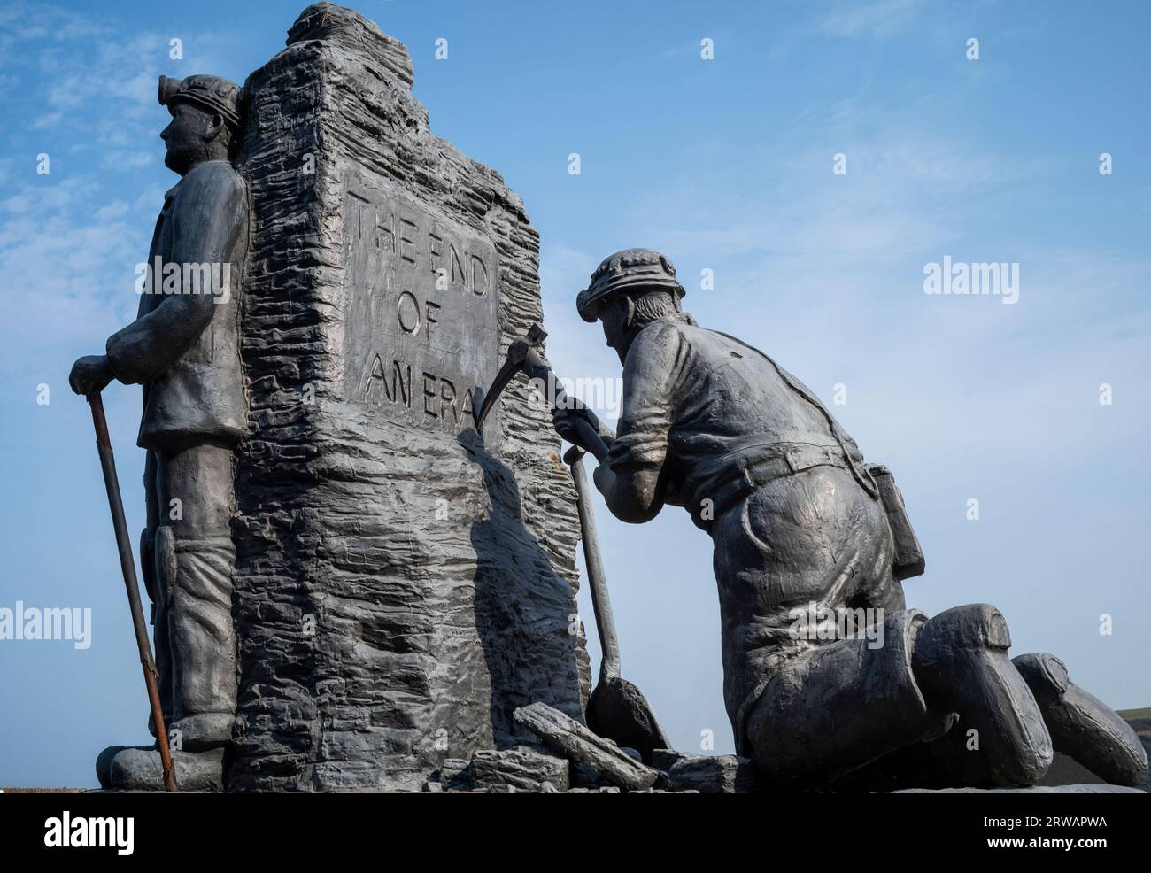 A tribute to the miners of Whitehaven by Colin Telfer (2005), Whitehaven harbour, West Cumbria, UK Stock Photo