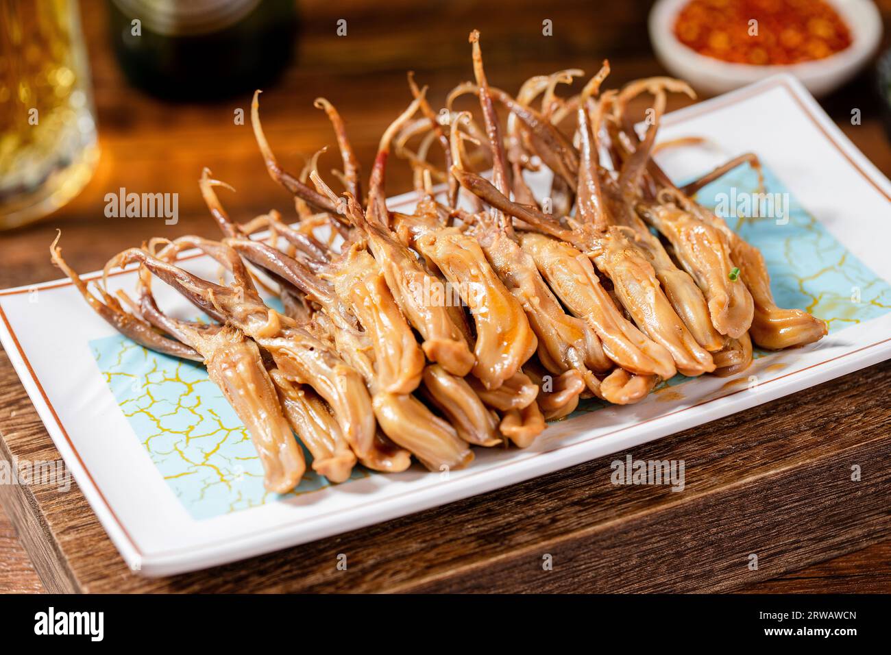 Marinated duck tongue in Spiced Sauce Stock Photo Alamy