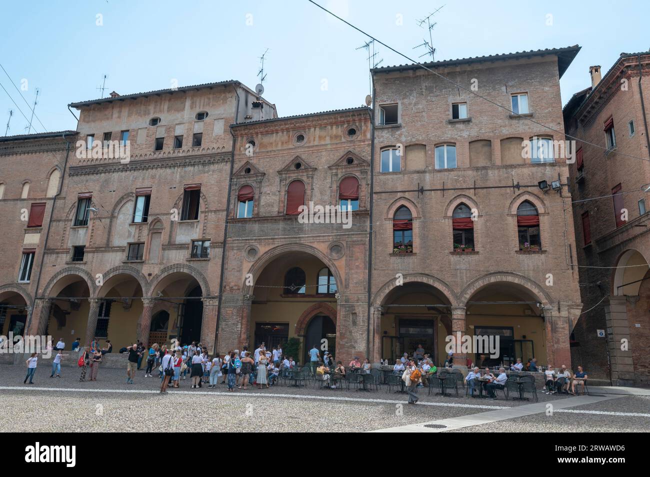 A row of Renaissance buildings with a number of eateries under  the long high ceiling porticos or colonnades with a roof structure supported with larg Stock Photo