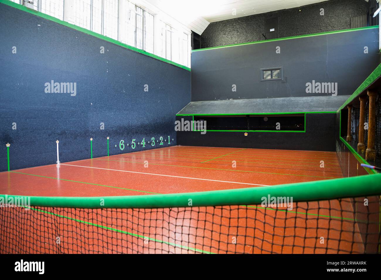 Interior / inside the Royal Tennis Court, Hampton Court Palace, a Grade I listed court for playing the sport of real tennis. (135) Stock Photo
