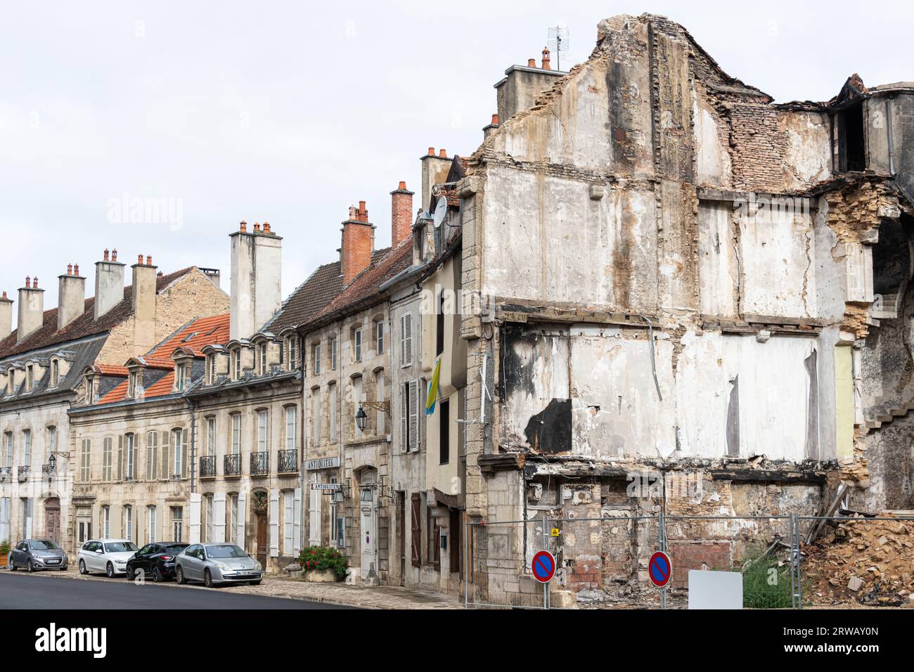 A Ruined House at the end of a terrace in Rue de Bourg, Chatillon-sur-Seine, France. Stock Photo