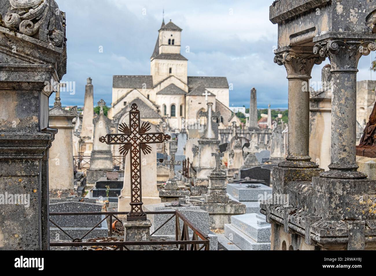 The graveyard of Church Saint-Vorles under stormy skies in Chatillon Sur Seine, Bourgogne-Franche-Comte, France. Stock Photo