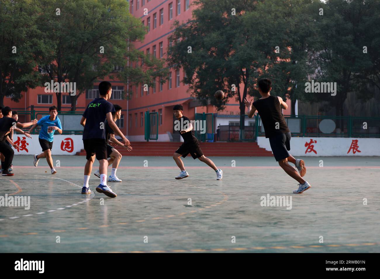 Luannan County, China - September 23, 2019: Handball players of middle school students are training, Luannan County, Hebei Province, China Stock Photo