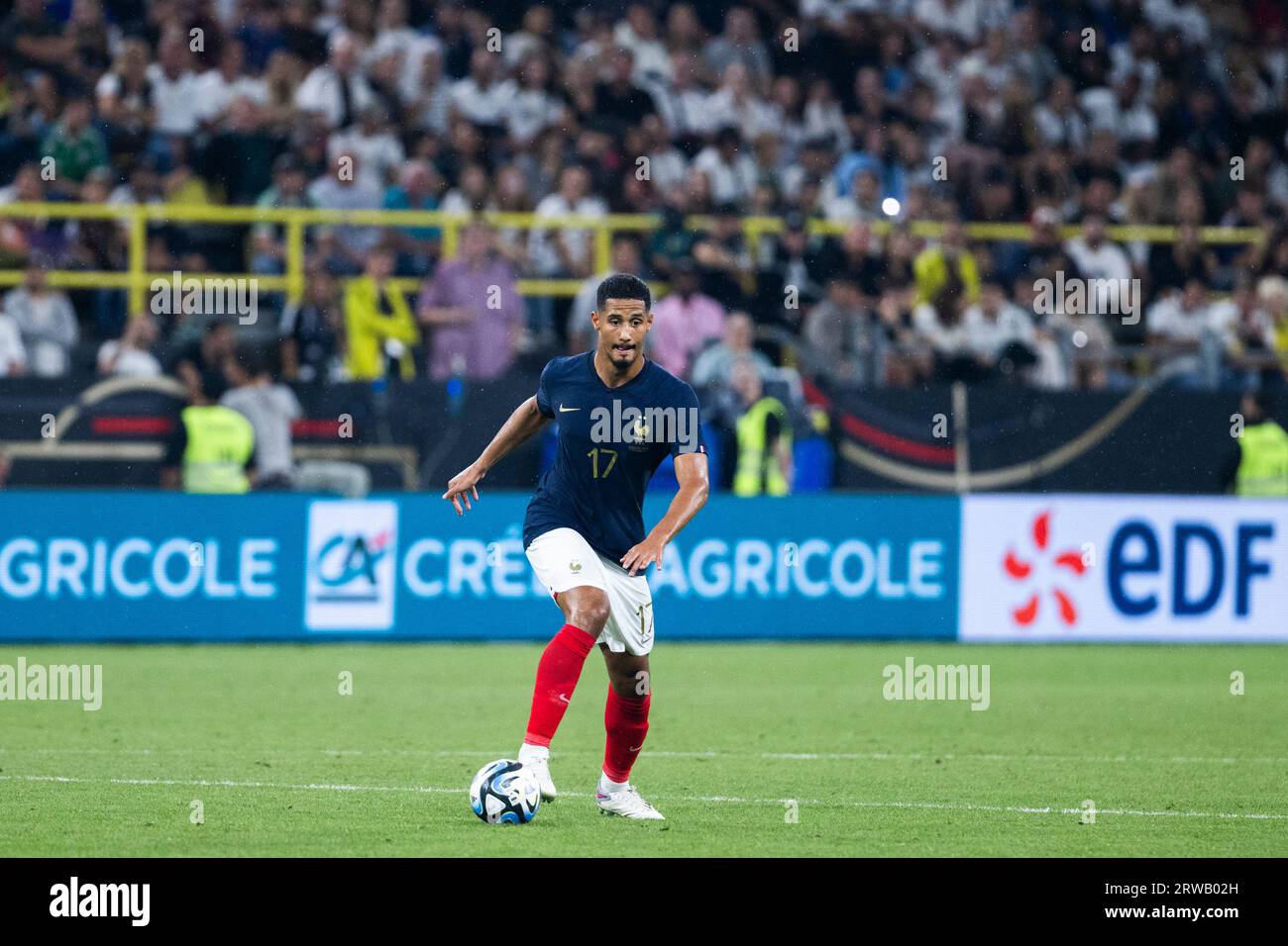 Dortmund, Signal-Iduna Park, 12.09.23: William Saliba of france runs with the ball during the friendly match between Germany vs. France. Stock Photo