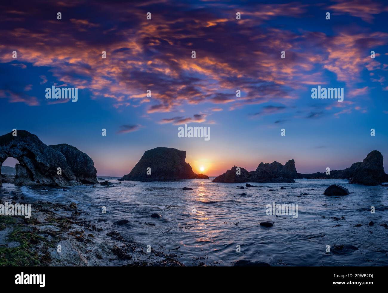 Sunset at the Elephant Rock at Ballintoy in County Antrim, Causeway coastal route, Northern Ireland Stock Photo