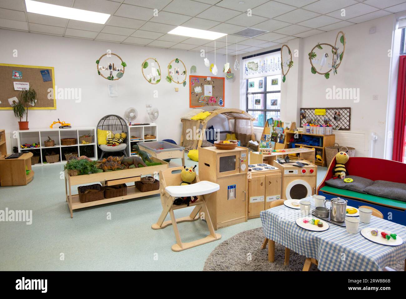 Nursery classroom scene for primary aged school children full of children's activities. Stock Photo