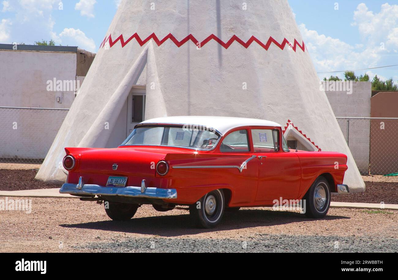classic american cars outside wigwam village and motel at Holbrook